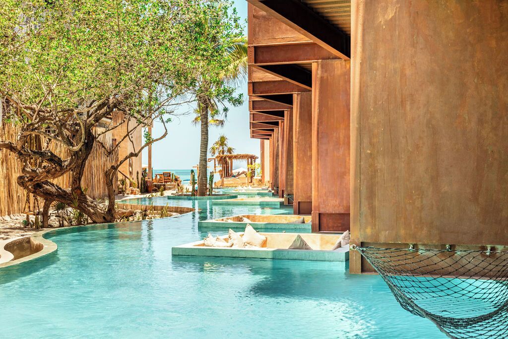 2 outdoor pools, open 8:00 AM to 10:00 PM, pool loungers