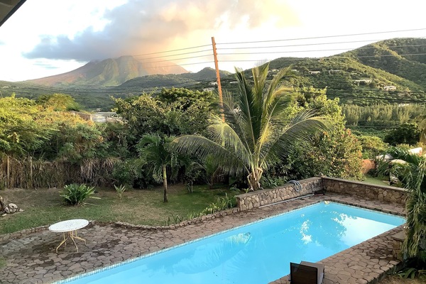 Pool with view of volcano in background