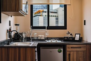 Loft, terraço | Cozinha privada | Micro-ondas, fogão, torradeira, liquidificador