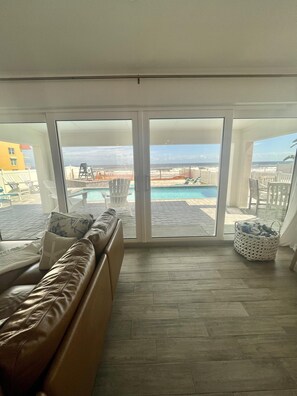 Smart TV, fireplace, books - Renovated, direct oceanfront 5BR/6BA private pool home sleeps 16. (New Smyrna Beach)