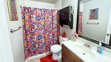 Bathtub, hair dryer, towels