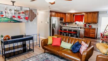 Smart TV, fireplace, video games, foosball