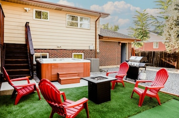 Immerse yourself in our property, a true getaway paradise featuring a hot tub, firepit, outdoor seating, and a BBQ grill – the perfect ingredients for an unforgettable escape!
