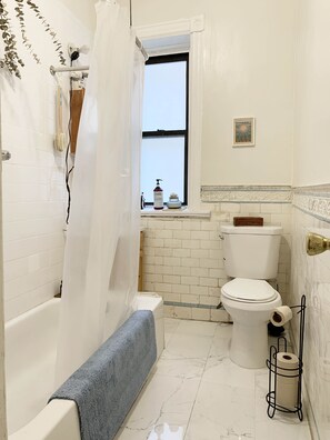 Hair dryer, towels, soap, toilet paper