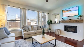 Smart TV, fireplace, foosball