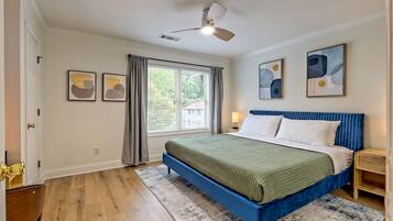 1 bedroom, desk, iron/ironing board, travel crib