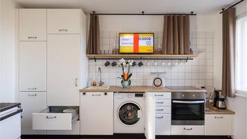 Réfrigérateur, four, plaque de cuisson, cafetiÚre/bouilloire