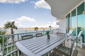 Outdoor dining - 🌊Resort Style Condo w/ Pool & Marina - Caribe D106🌊 (Orange Beach)
