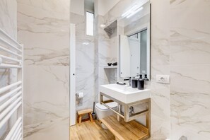 Hair dryer, towels, shampoo