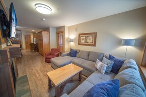 Premier Condo, 2 Bedrooms, Pool Access, Ground Floor (Springs 8802) | Living area | 42-inch flat-screen TV with cable channels, fireplace - Springs 8802 (Keystone)