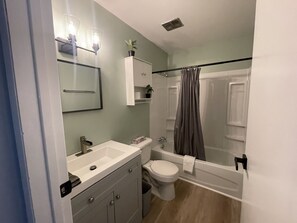 Hair dryer, towels, soap, toilet paper