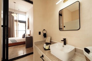 Suite terus | Bathroom | Shower, hair dryer, bathrobes, soap