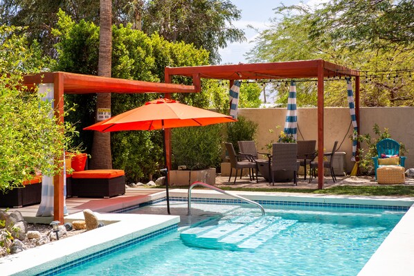 Outdoor pool, pool umbrellas, sun loungers
