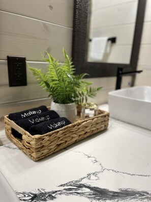 Hair dryer, towels, soap, shampoo