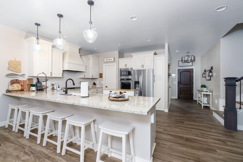 Papa's Place - Modern Rainbow Lake Home w/AC, Game Room, Furnished Deck & BBQ