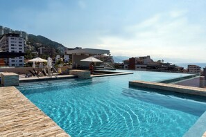 Outdoor pool, a heated pool - TWO BEDROOMS, TWO BLOCKS FROM THE BEACH (Puerto Vallarta)