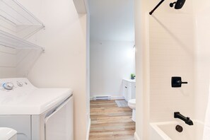 Hair dryer, towels, toilet paper - Rustic Charm Meets Modern Luxury: Stylish 2BR, 1BA Apartment (Auburn)