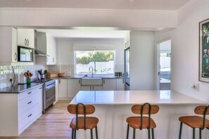 Coffee/tea maker, fridge, microwave, oven