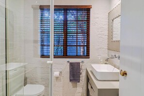 Bathtub, hair dryer, towels, soap