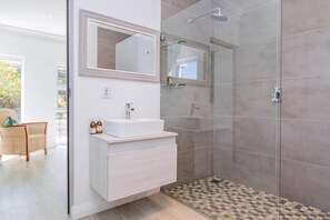 Bathtub, hair dryer, towels, soap