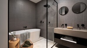 Bathtub, hair dryer, towels
