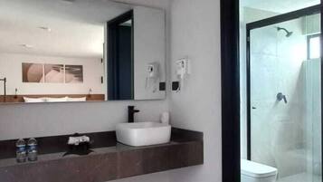 Shower, rainfall showerhead, towels