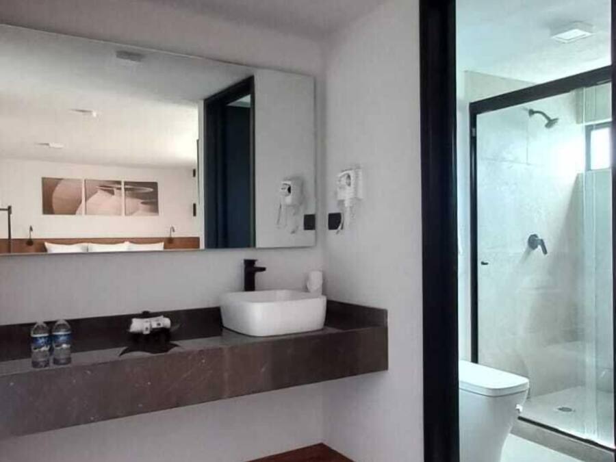 Shower, rainfall showerhead, towels