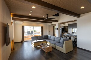 Romantic House | Living area | 32-inch flat-screen TV with digital channels