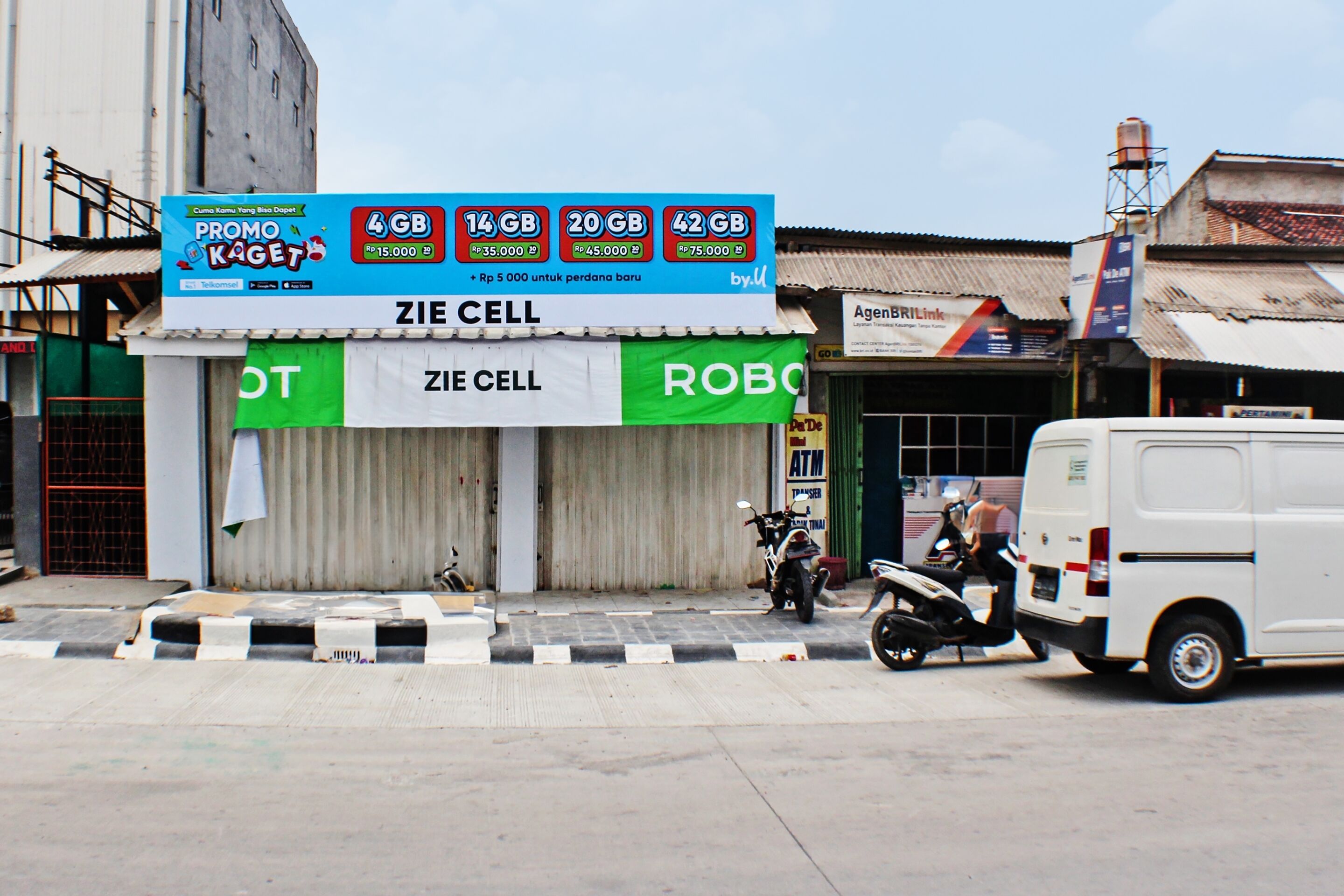A ZIE CELL store with a signboard advertising mobile data plans.