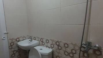 Standard Double Room | Bathroom | Shower, towels, toilet paper