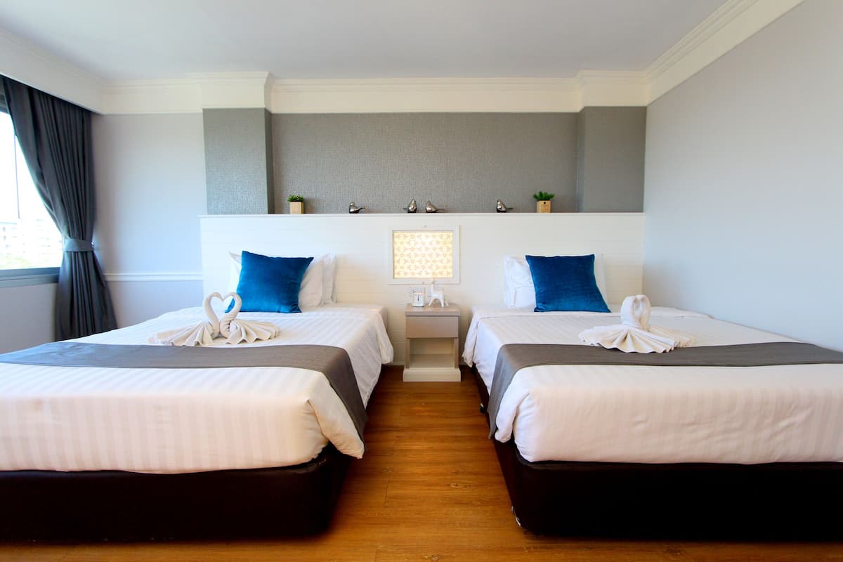 Habitación Deluxe con 2 camas individuales | 1 habitación, ropa de cama hipoalergénica y minibar