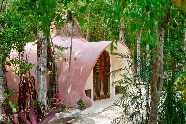 Blending seamlessly into the surrounding forest, this unique building offers a harmonious connection to nature.