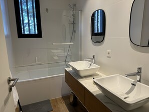 Shower, hair dryer, towels, soap