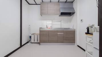 Fridge, microwave, stovetop, cookware/dishes/utensils