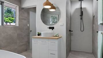 Hair dryer, towels, shampoo, toilet paper
