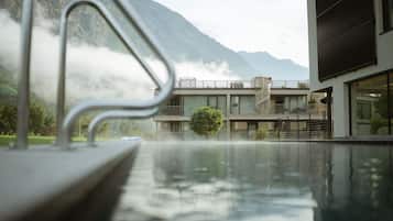Outdoor pool, pool umbrellas, sun loungers