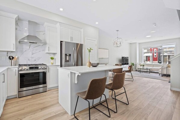 Fridge, microwave, oven, stovetop - Family Home in Livingston 4 Bed, 3.5 Bath (Calgary)