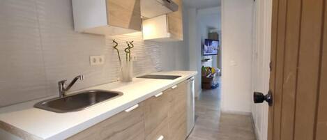 Fridge, microwave, stovetop, coffee/tea maker