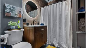 Bathtub, hair dryer, towels