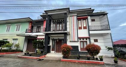 OYO 93143 Mega Raudhah Syariah