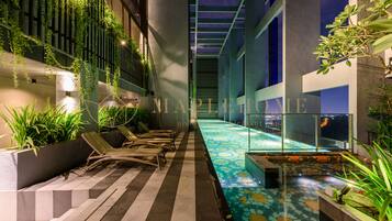 Outdoor pool, open 7:00 AM to 10:00 PM, sun loungers