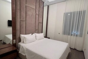 2 slaapkamers, een strijkplank/strijkijzer, gratis wifi, beddengoed