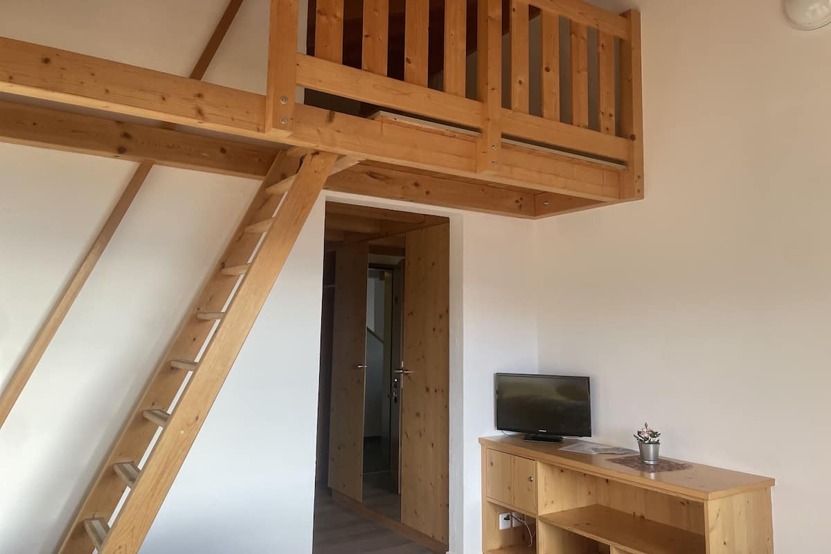 Habitación cuádruple Confort | Cunas, camas extra, wifi gratis y ropa de cama