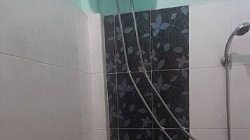 Deluxe Double Room | Bathroom | Shower, towels, toilet paper