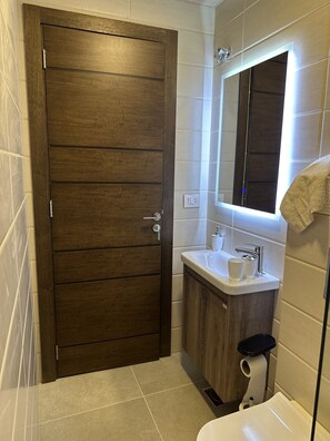 Shower, towels, soap, shampoo