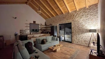 Villa | Área de sala de estar | Televisión