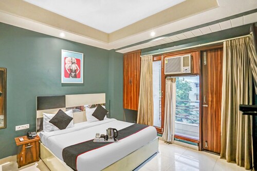 Qotel Hotel Church House Rohini Sector15