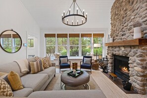 TV, fireplace - Juniper Presents: Modern Lakehouse Oasis with Pool + Fire Pit (Union Pier)
