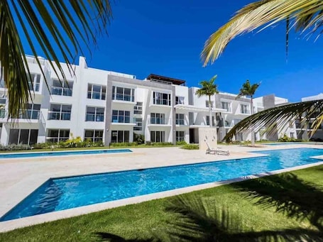 Pool. Discover comfort in our Punta Cana apartment. Welcome to Tropical Haven