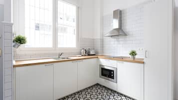 Loft conforto | Cozinha privada | Geladeira grande, micro-ondas, cooktop, cafeteira/chaleira